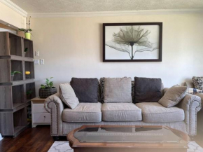 Nature-surrounded 3-bedroom apartment (main floor) with free parking and spacious patio